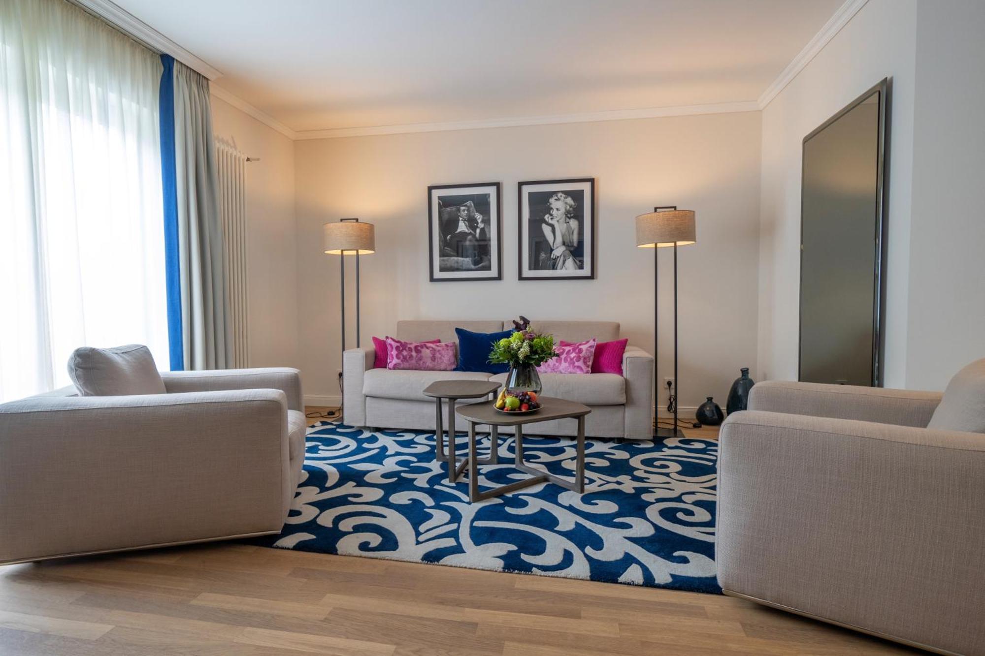 Vila Vita Rosenpark Marburg Exteriér fotografie A living room at the Hotel